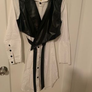 White dress & black vest.